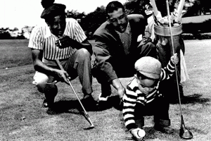 Barrow learned to play golf under the watchful eyes of Ted Rhodes (left) and his father (right).