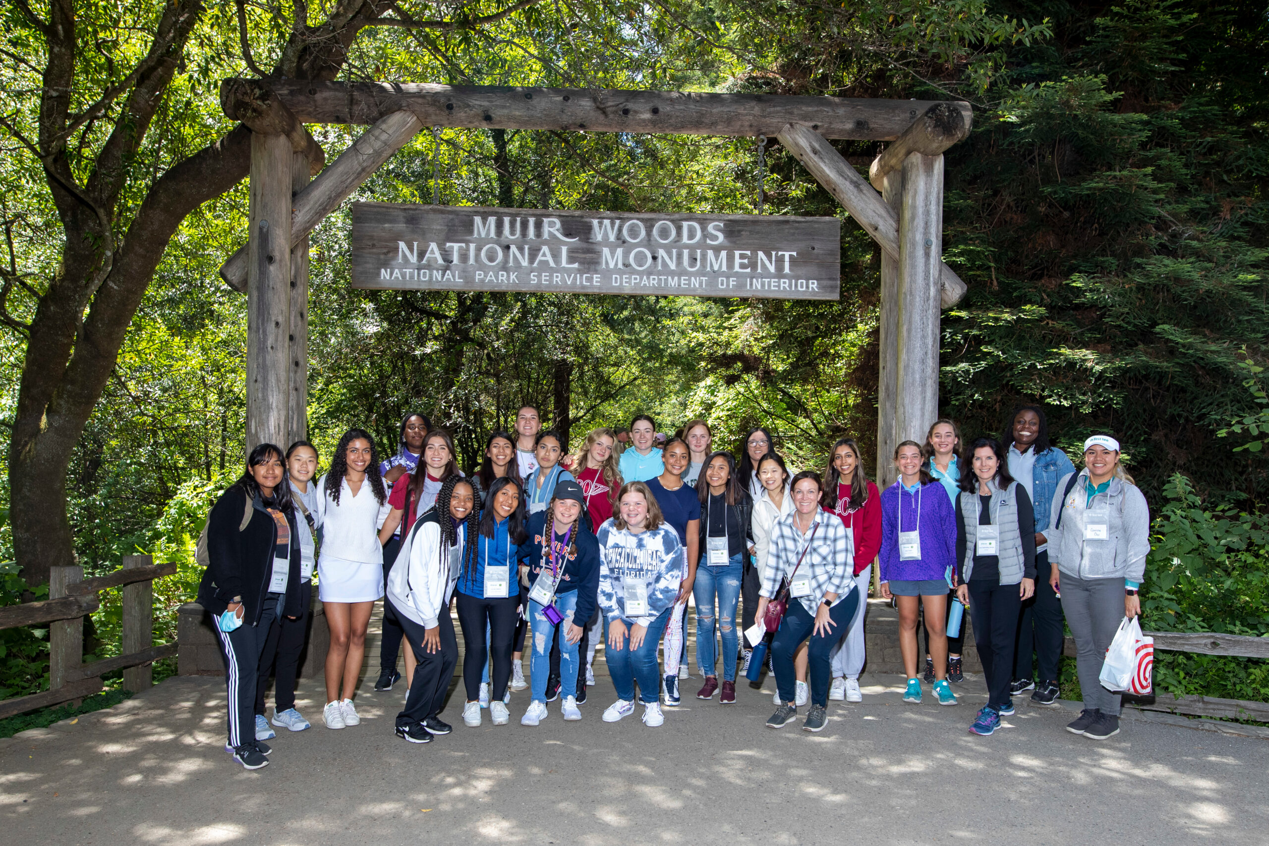 Group of participants posing at the Muir Woods National Monument.