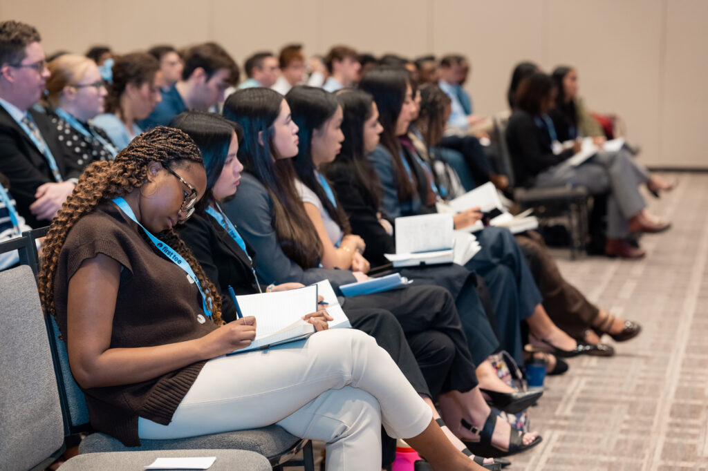 Winter Workshop: Students watching presentation and taking notes